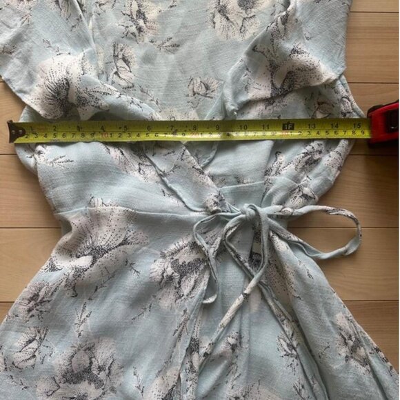 Soft and romantic wrap mini dress in a pale blue floral print by Free People - Picture 5 of 8